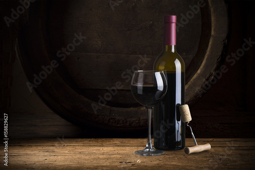 Closeup of red wine pouring in glass