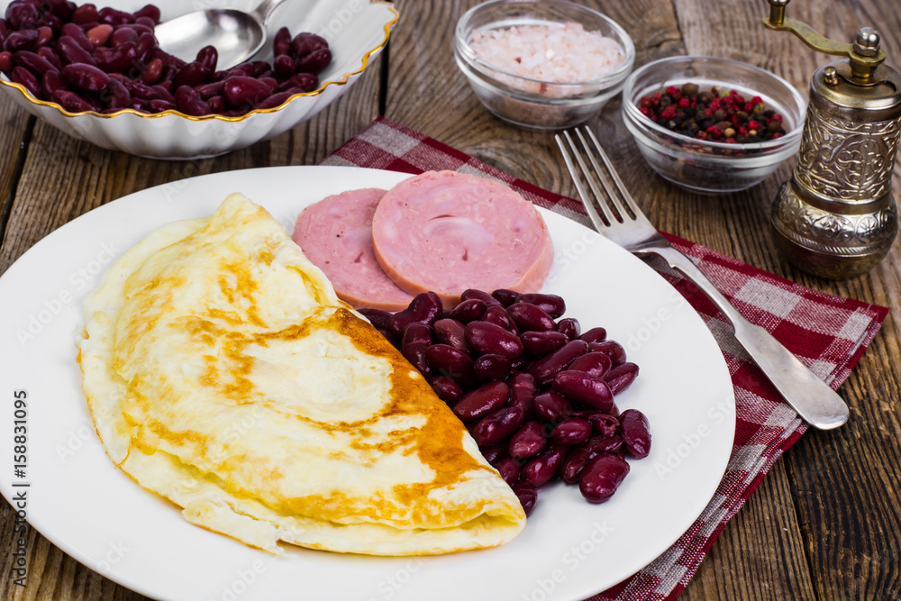Tasty omelette and chicken ham for breakfast Tasty omelette and chicken ham for breakfast
