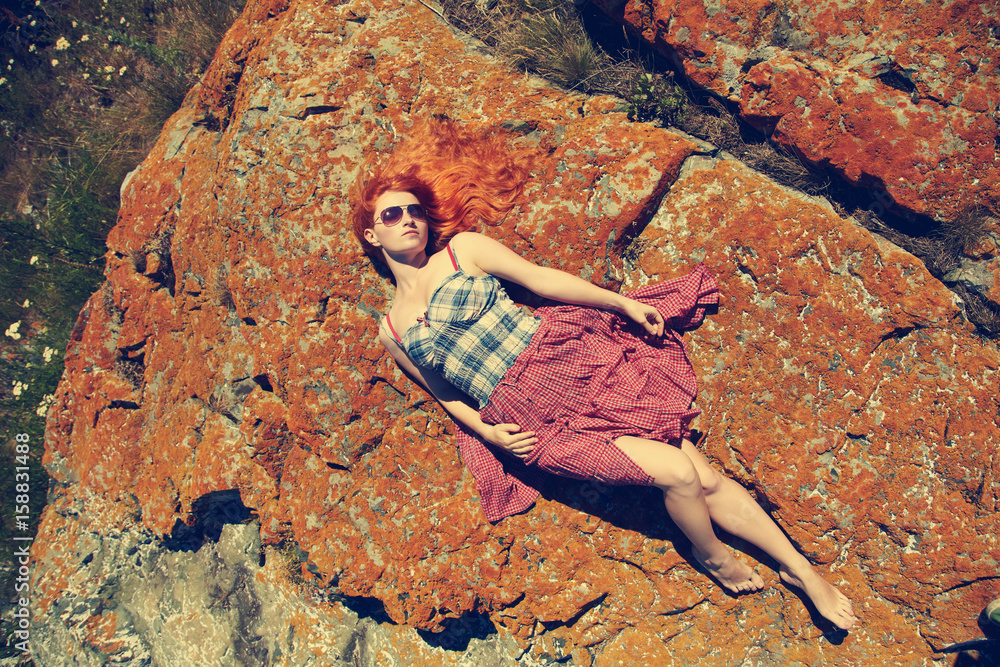 Obraz premium lying redhead girl relaxing