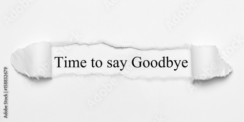 Time to say Goodbye on white torn paper photo