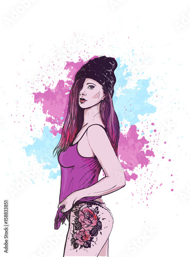 Beautiful girl in hat with tattoo