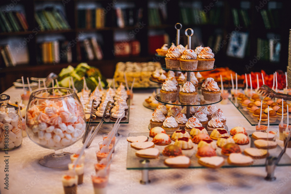 Delicious wedding reception candy bar dessert table