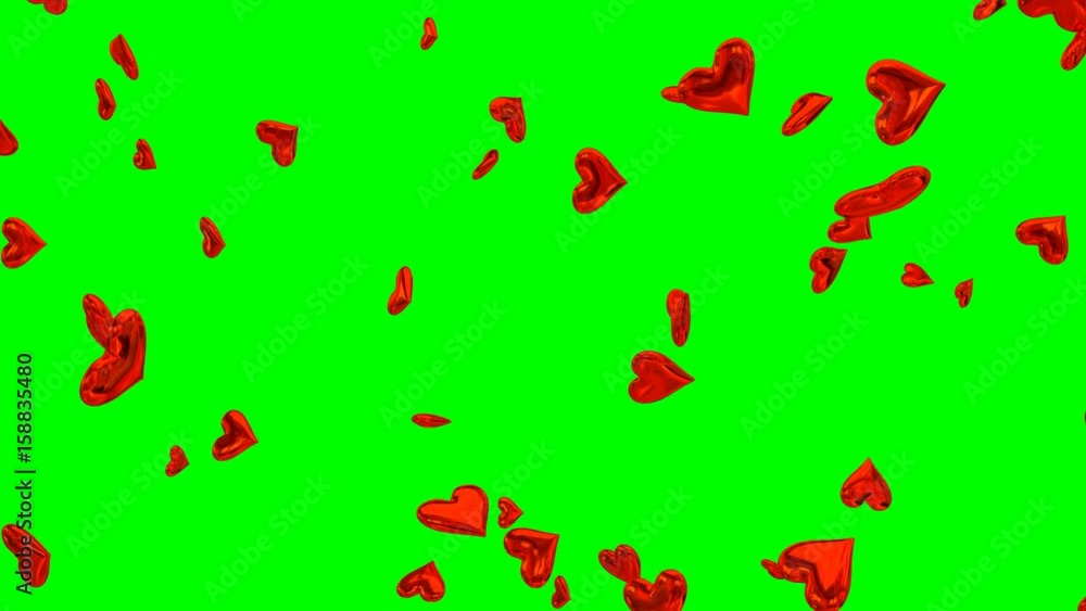 Animated rain of hearts in slow motion against green background in 4k. Animated rain of hearts in slow motion against green background in 4k.