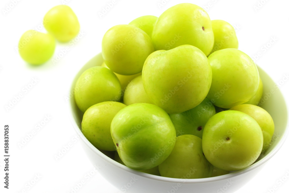 fresh turkish can erik plum fruits in a small white bowl fresh turkish can erik plum fruits in a small white bowl
