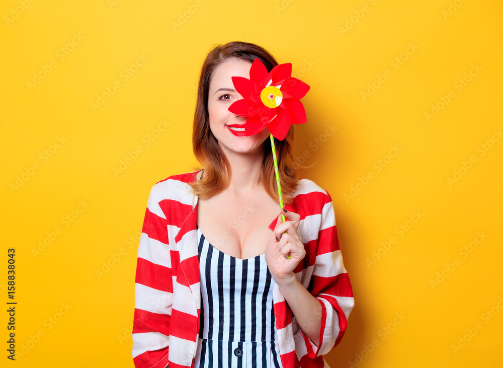 Woman with pinwheel toy