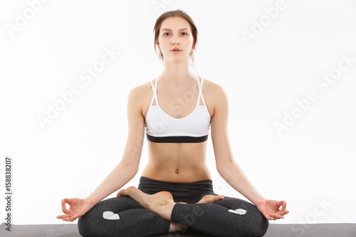 Young woman exercise yoga supported headstand