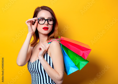 Woman with colour shopping bags