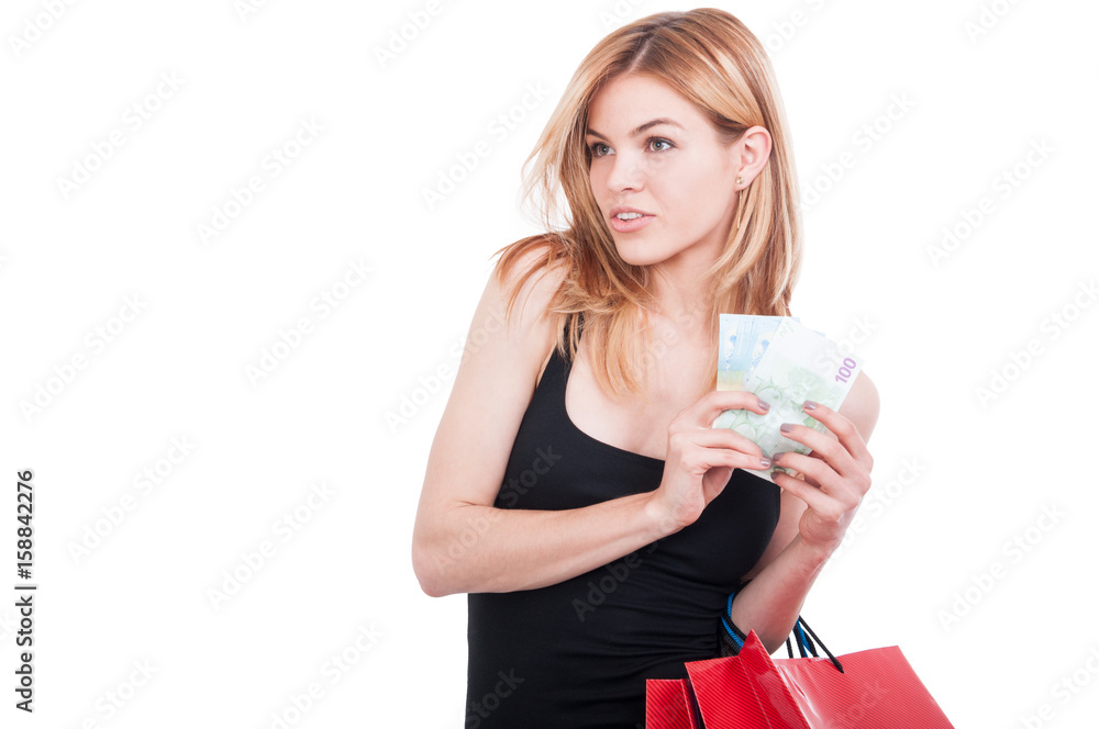 Beautiful blonde shopper buying new clothes Beautiful blonde shopper buying new clothes