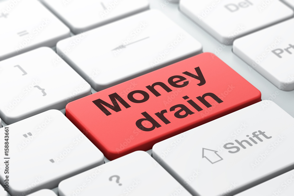 Currency concept: Money Drain on computer keyboard background Currency concept: Money Drain on computer keyboard background