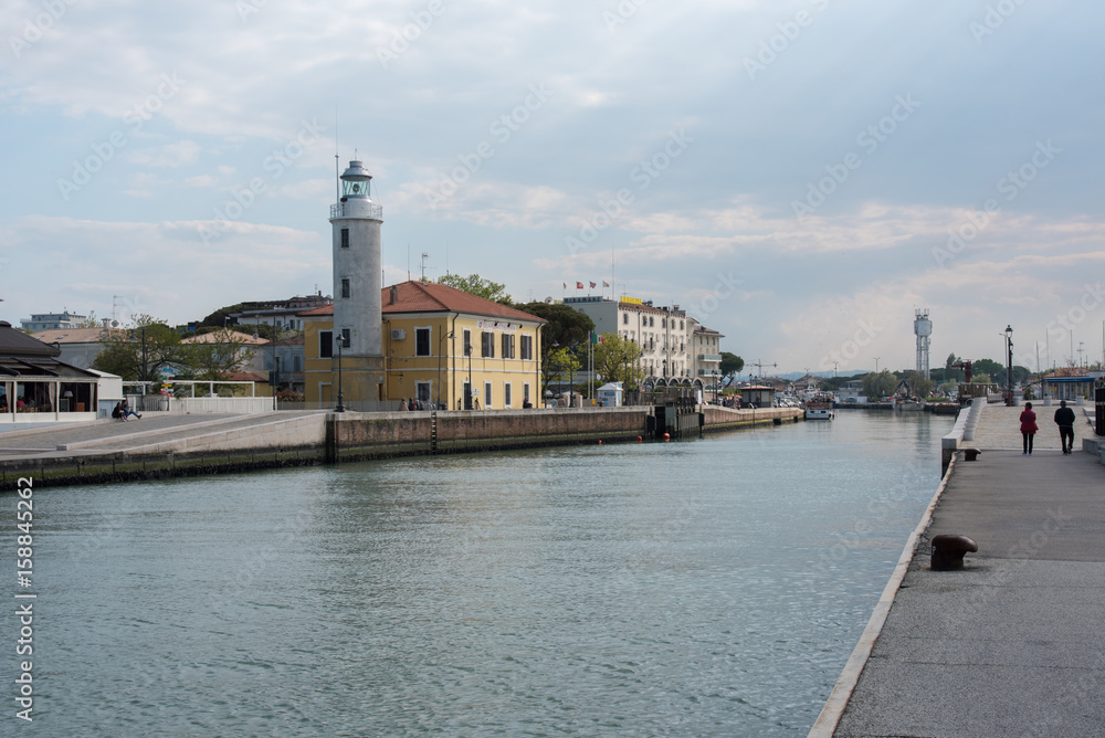 Lighthouse in the canal harbor of Cesenatico. Romagna coast Lighthouse in the canal harbor of Cesenatico. Romagna coast