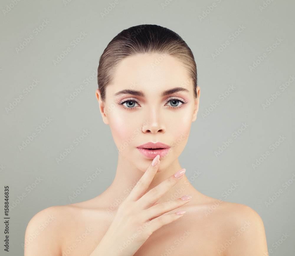 Beautiful Spa Model Woman with Healthy Skin and Manicure Hand. Skincare Concept Beautiful Spa Model Woman with Healthy Skin and Manicure Hand. Skincare Concept