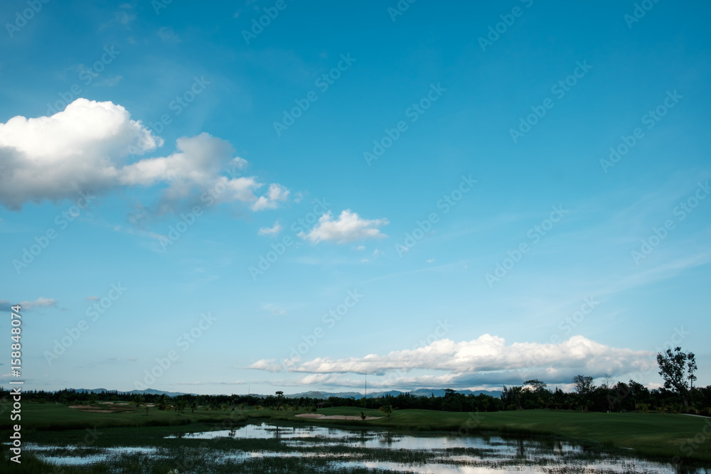white cloud on blue sky over land
