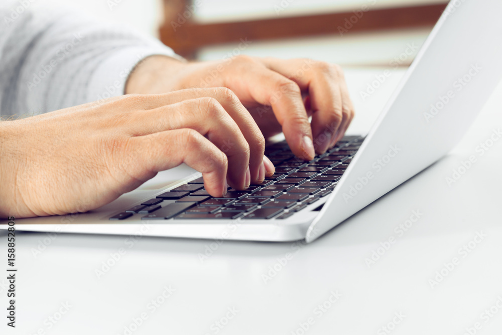 Businessman working on laptop. On the table Businessman working on laptop. On the table