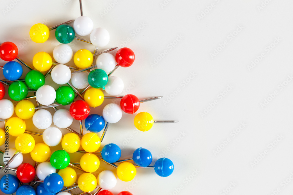colorful color push pins isolated on white background