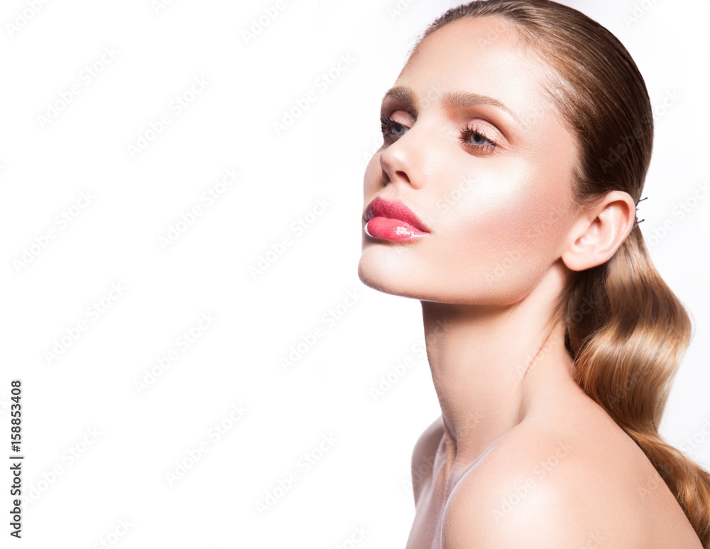 Beauty portrait of model with natural make-up. Fashion shiny highlighter on skin, sexy gloss lips make-up Beauty portrait of model with natural make-up. Fashion shiny highlighter on skin, sexy gloss lips make-up