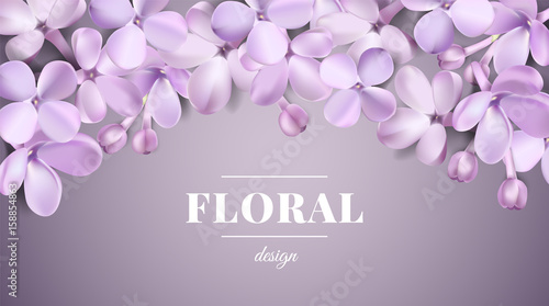 Pastel background with lilac flowers.