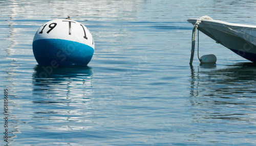 Fotografija Mooring ball for boat in water