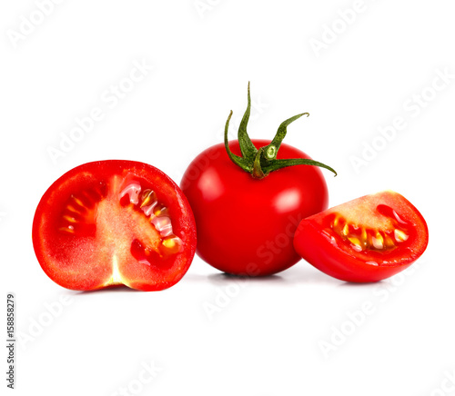 Fresh ripe tomato and one cut