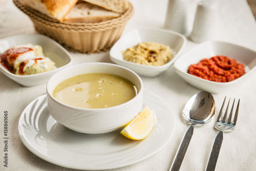 Lentils soup served on the table in turkish restaurant Lentils soup served on the table in turkish restaurant