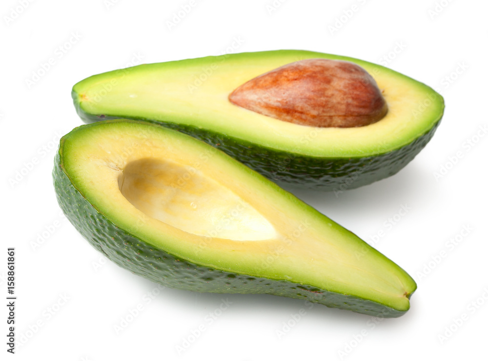 Avocado halves isolated on white background Avocado halves isolated on white background