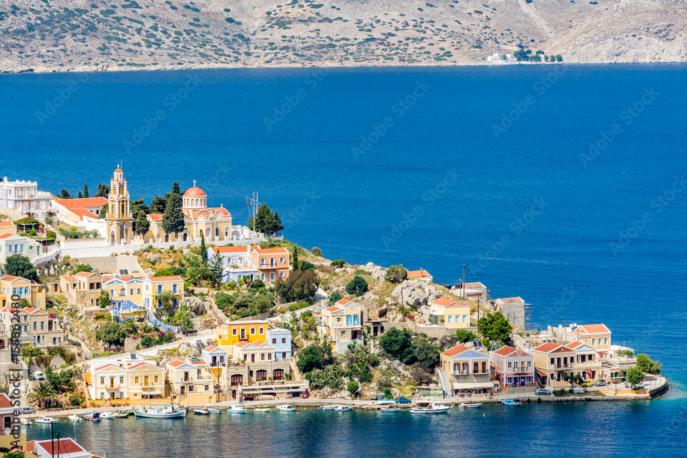 Cityscape of the capital city of a picturesque, romantic Symi island, Greece