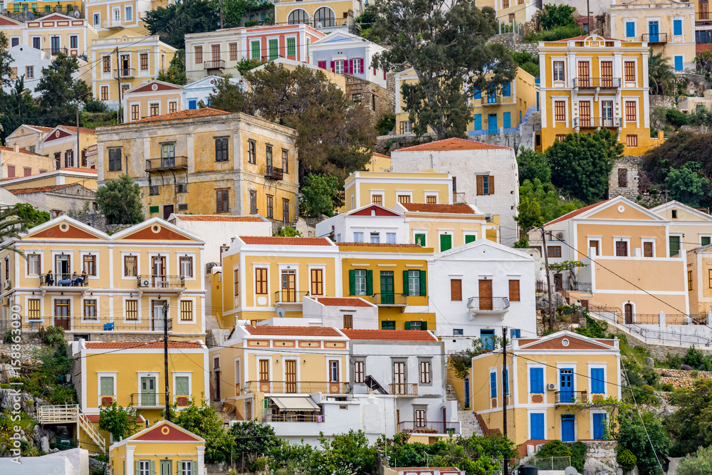 Obraz premium Colourful, picturesque houses at Symi island, Greece