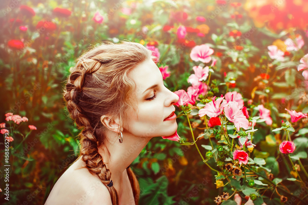 Woman in the summer garden Woman in the summer garden