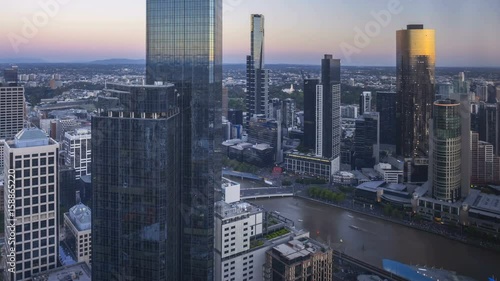 Wallpaper Mural Time lapse sunrise night to day cityscape. Aerial view of urban city skyline. Melbourne CBD, Australia. Zoom out Torontodigital.ca