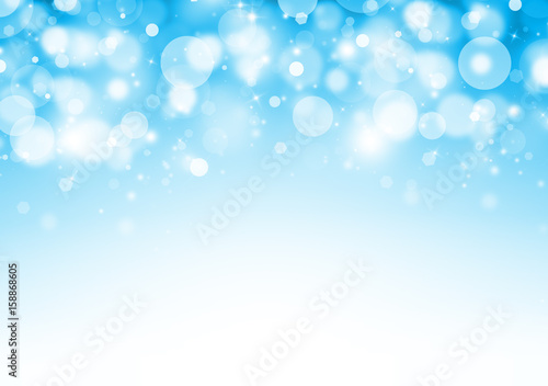 Blue glitter sparkles rays lights bokeh Festive Elegant abstract background.