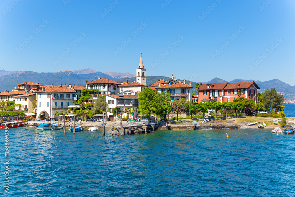 Stresa, Verbania, Italy - April 21, 2017: View of Island Fishermen; the Borromean Islands of Lake Maggiore in Piedmont, Italy.