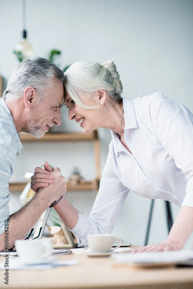 Fototapeta premium Business partners shaking hands at office