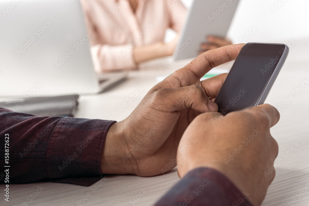 Cropped shot of person using smartphone with blank screen Cropped shot of person using smartphone with blank screen