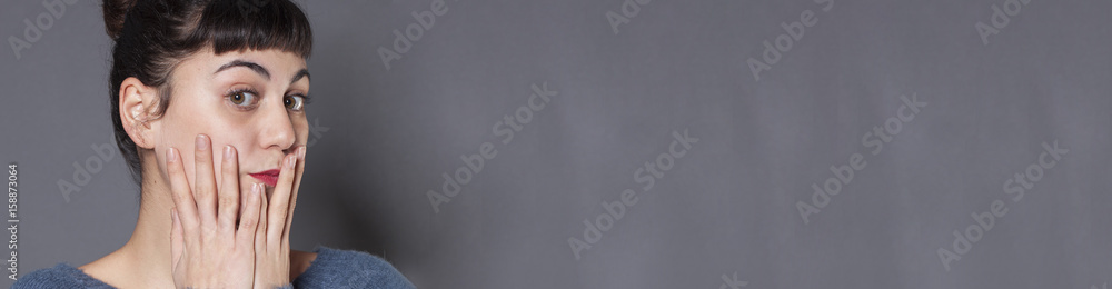 pretentious girl with fair skin expressing embarrassment, copy space banner pretentious girl with fair skin expressing embarrassment, copy space banner
