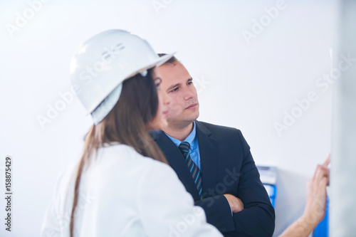 Business people meeting with construction engineer architect