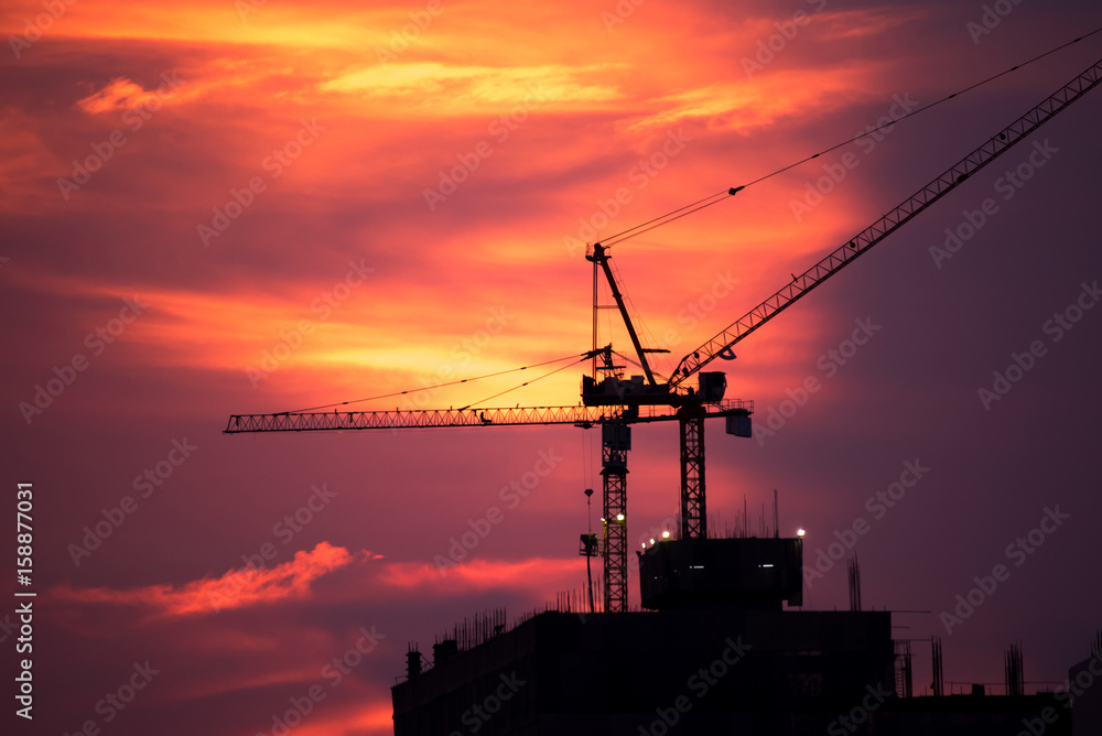silhouette  construction site at sunset