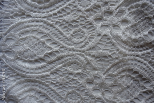 Close up of white lace from above