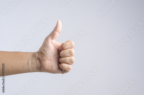 Thumb up hand sign © bonnontawat