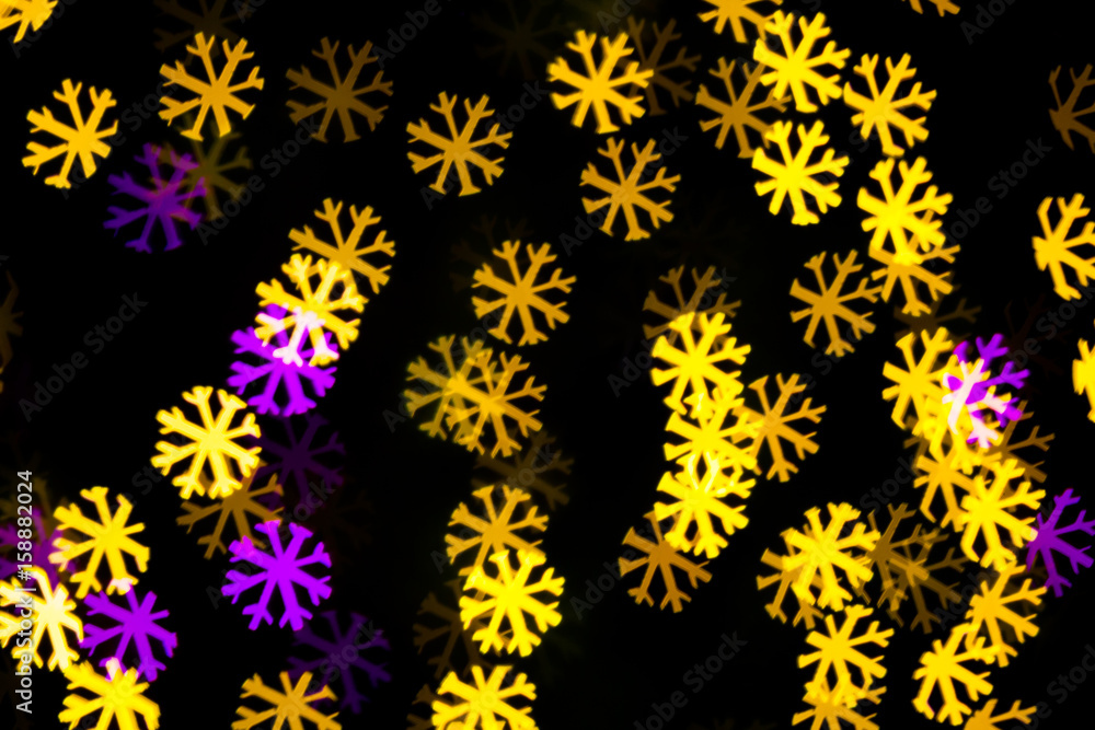 Abstract Yellow Purple lights snow flake bokeh background