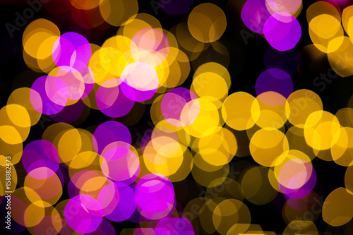 Abstract Yellow Purple lights bokeh background © ekachai050050