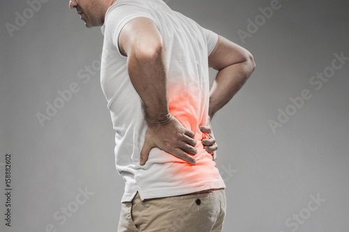 Tableau sur toile close up of man suffering from backache