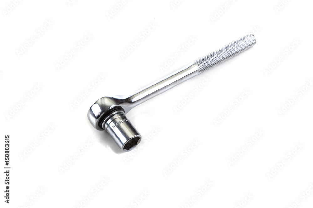Ratchet fitted with a socket isolated on white background Ratchet fitted with a socket isolated on white background
