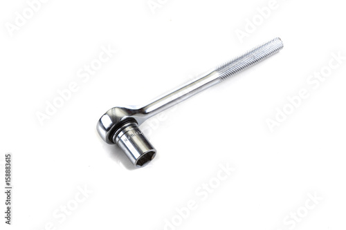 Ratchet fitted with a socket isolated on white background © Ben Gingell