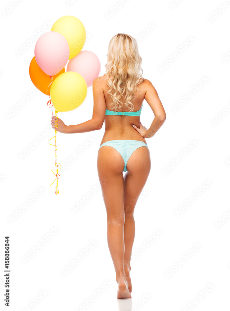 woman in bikini swimsuit with air balloons woman in bikini swimsuit with air balloons
