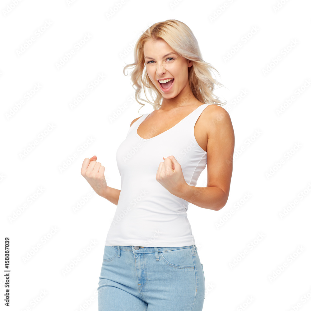 happy young woman doing fist pump gesture happy young woman doing fist pump gesture