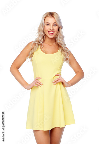 happy smiling beautiful young woman in dress © Syda Productions