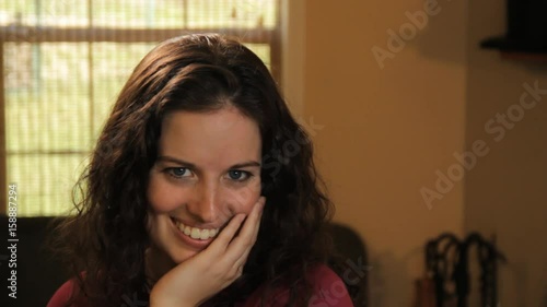 Close up, woman plays coy