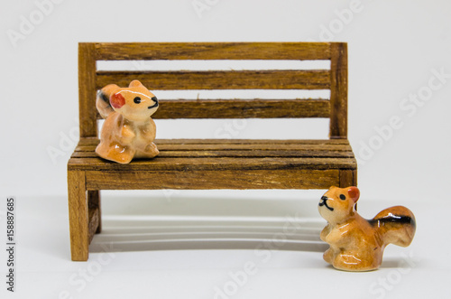 Squirrel Cerimic On Wooden Bench In The Park Handmade Design Interior Decoration Showcase Bedroom Backyard Collection in Showcase photo