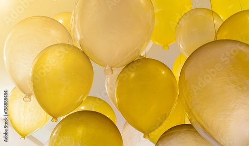 White and yellow ballons composition