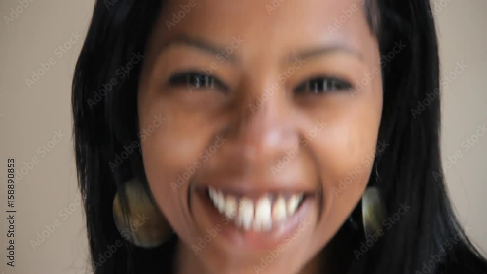 Close up, smiling woman laughs Close up, smiling woman laughs