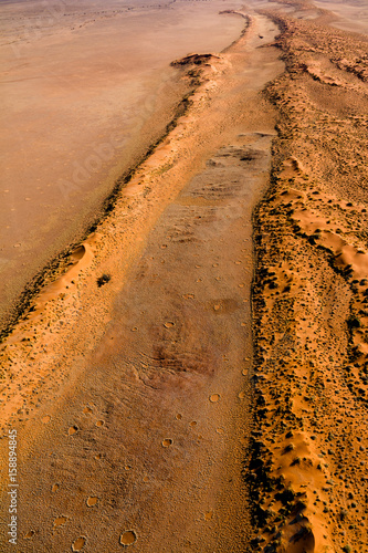 aerial view of the dunes of sossusvlei, part of the namib desert, located in namib naukluft park, namibia, africa photo